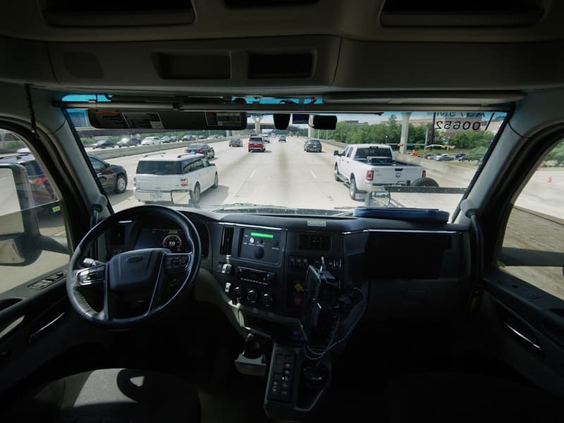 Inside the cab of an autonomous truck
