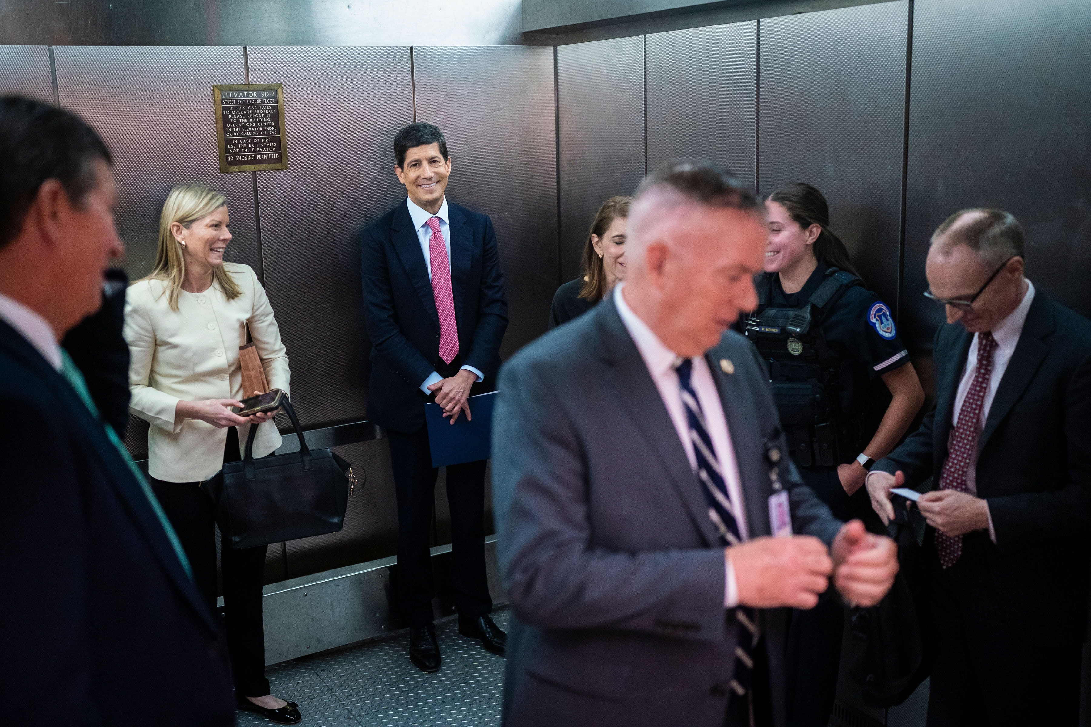 Kevin Warsh leaving the Dirksen Senate building